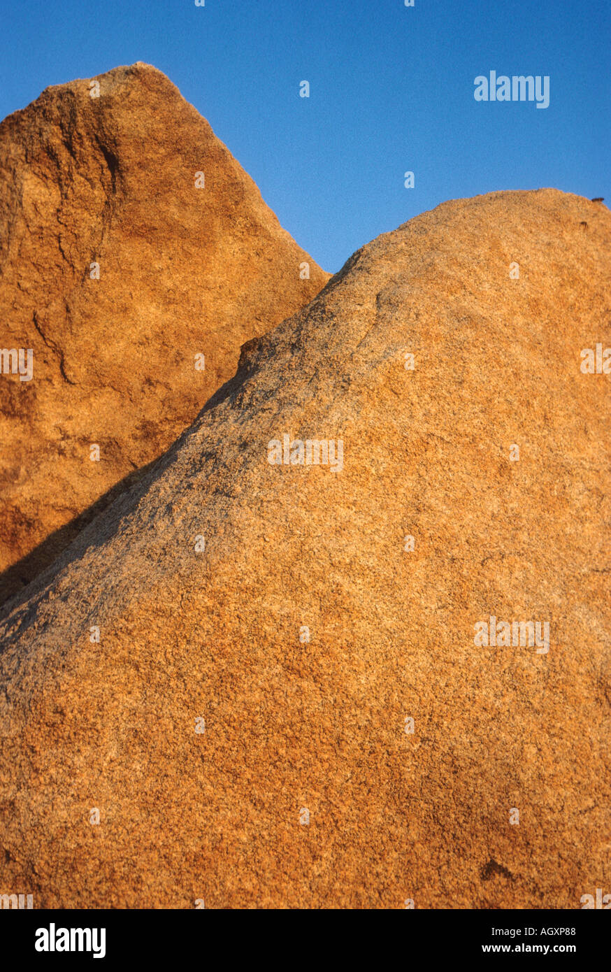 Tors de granit au coucher du soleil Banque D'Images