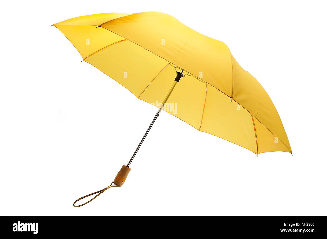 Parapluie jaune se découpant sur un fond blanc Banque D'Images