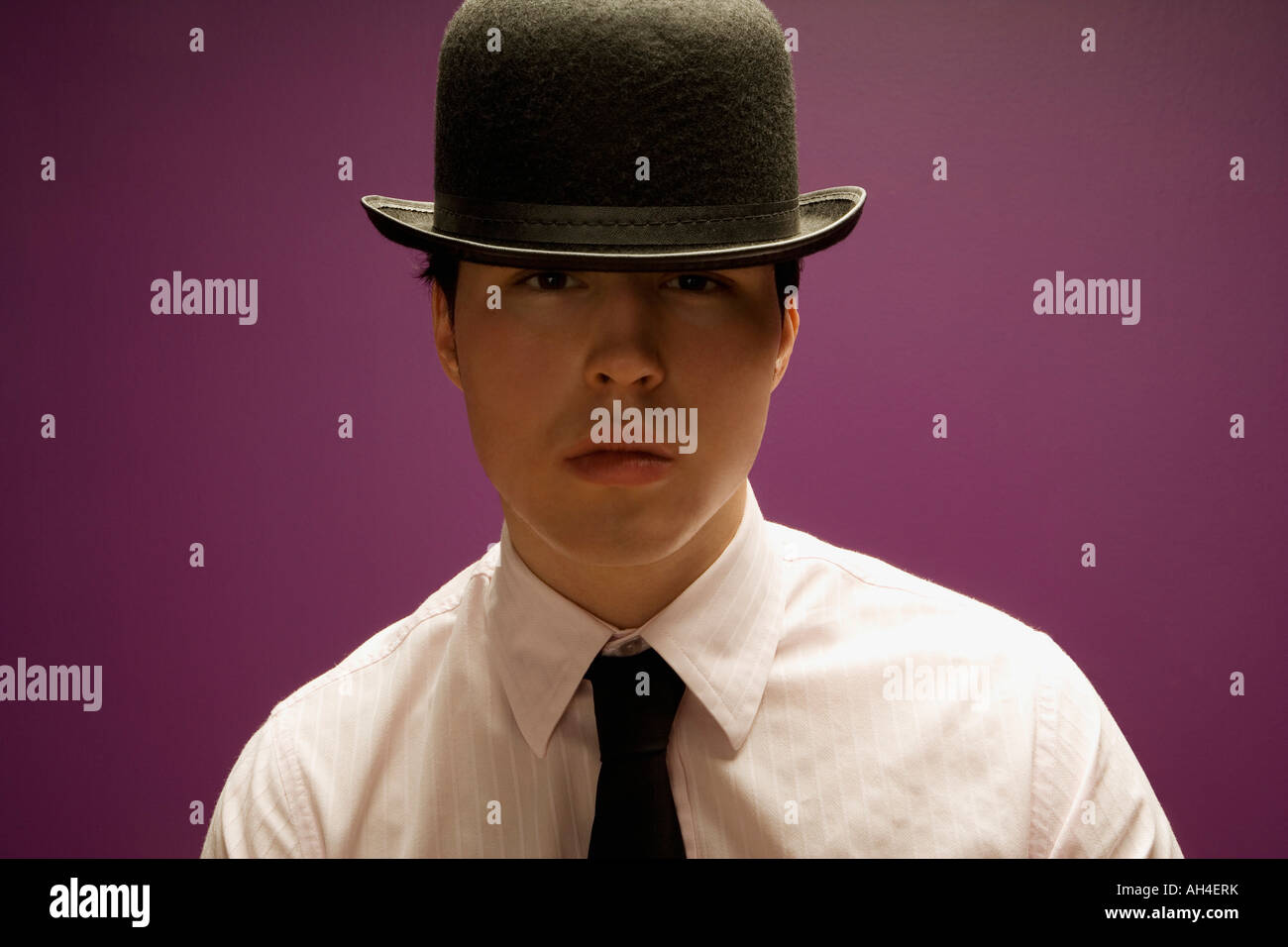 Man wearing cheap bowler hat