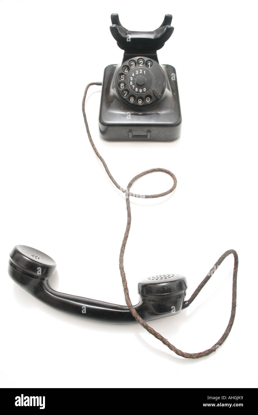 Un vieux millésime téléphone dans l'Éclairage dramatique Banque D'Images