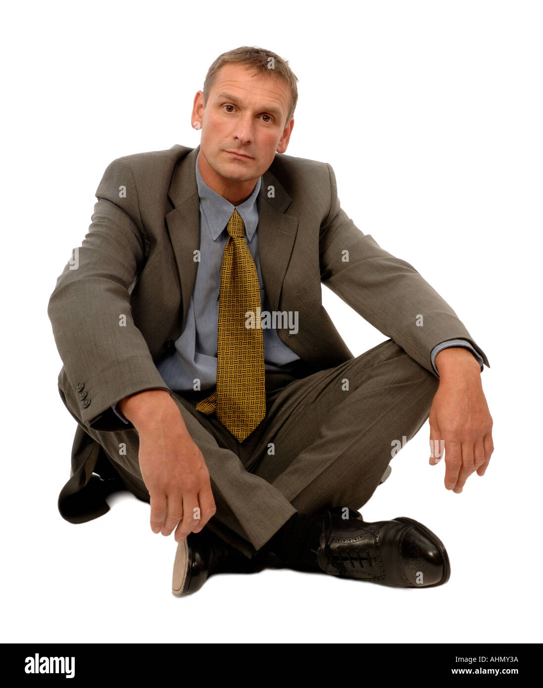 Businessman sitting on the floor Banque D'Images