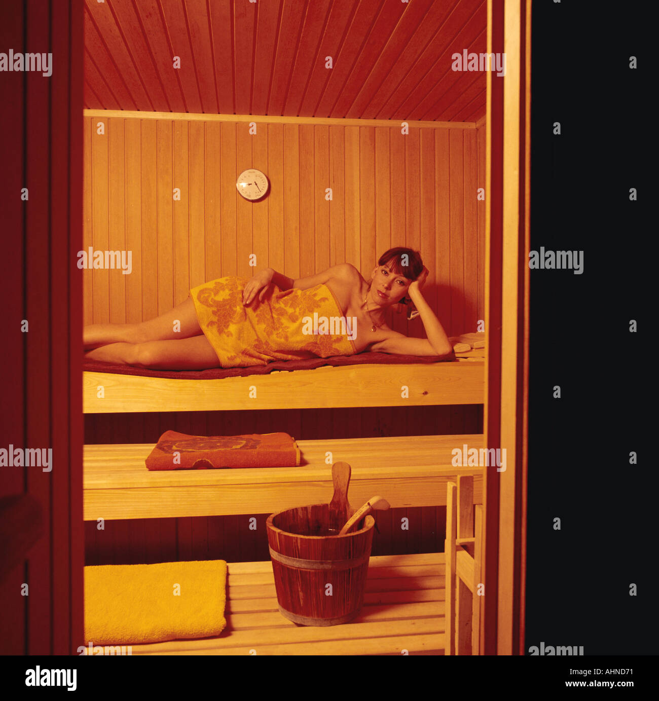 Young woman relaxing in sauna France Europe Banque D'Images