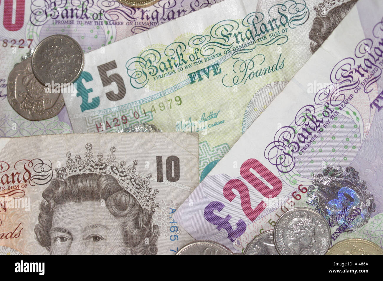 Un mélange de billets de banque britannique cash Banque D'Images