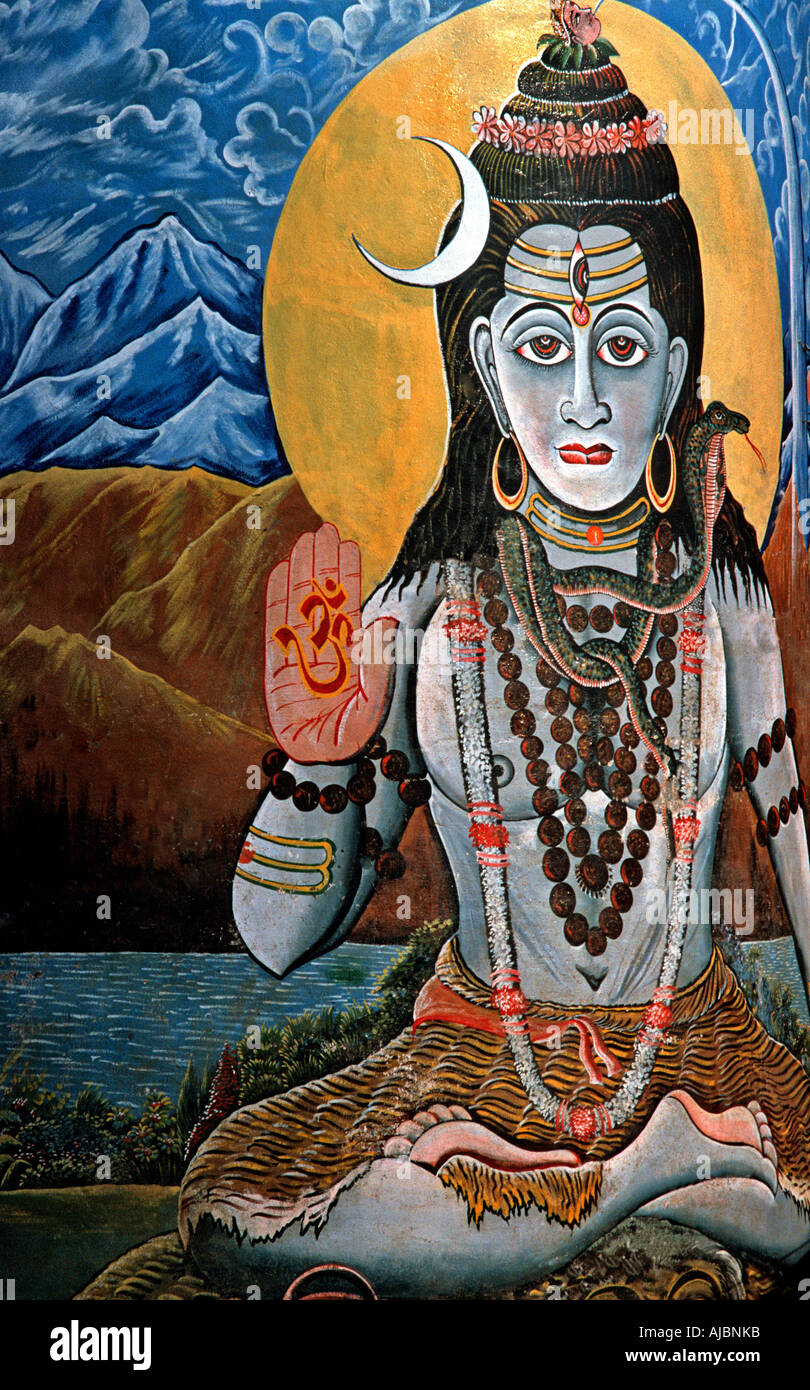Peinture sur un mur à côté d'un ghat à Varanasi Inde représentant Krishna Banque D'Images