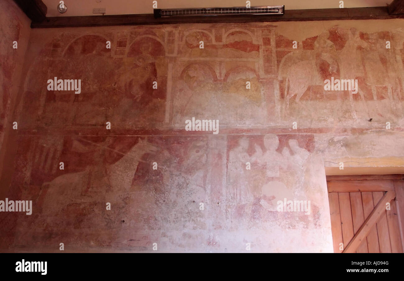 Début des peintures murales médiévales dans l'église St Botolphs, Hardham, West Sussex. Banque D'Images