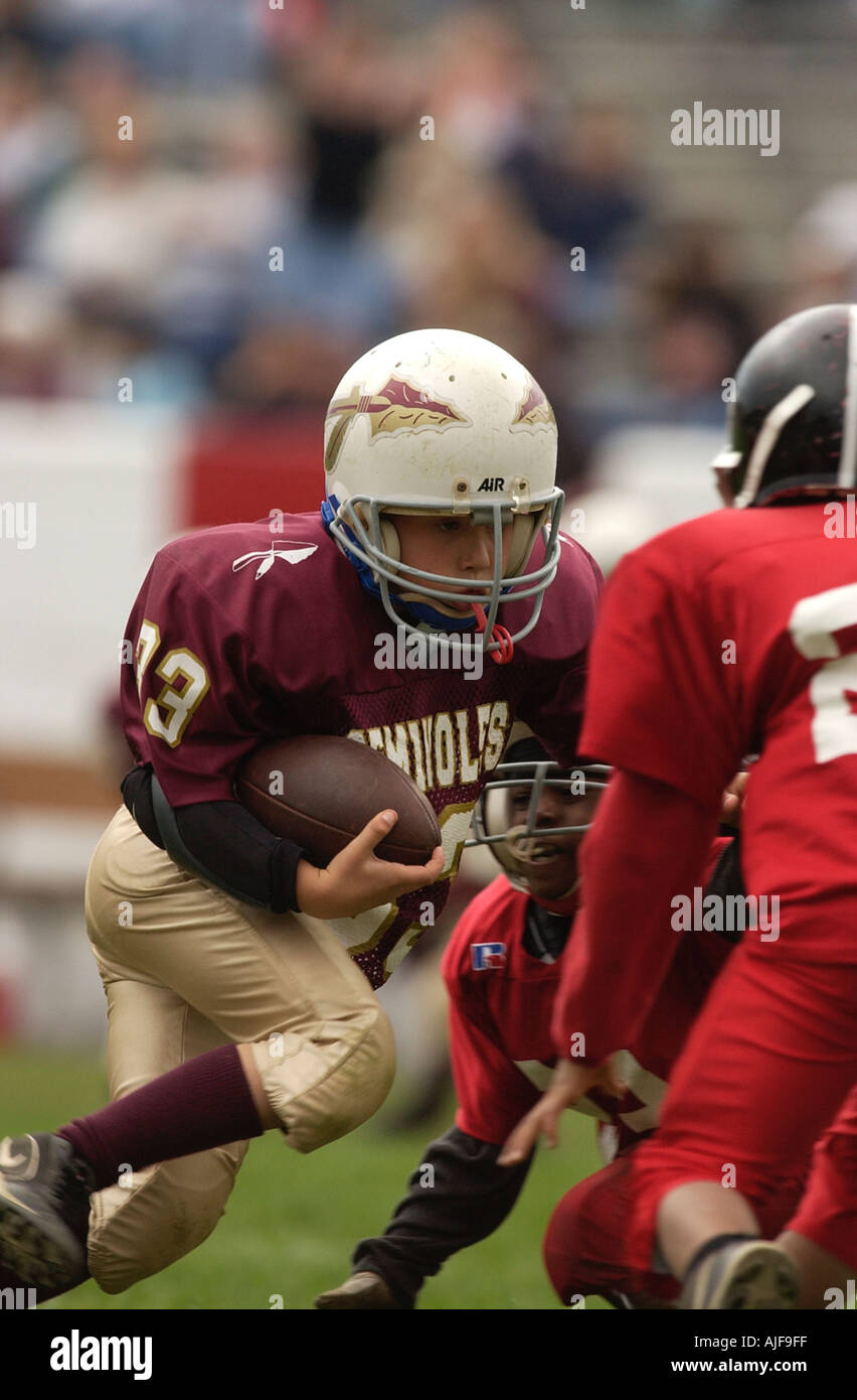 Biddy jeunesse action football américain Banque D'Images