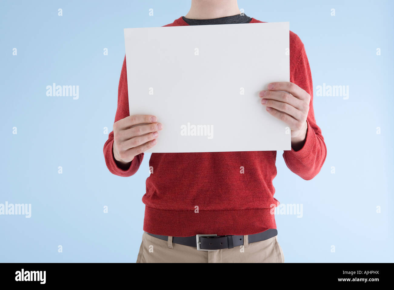 Man holding blank placard Banque D'Images