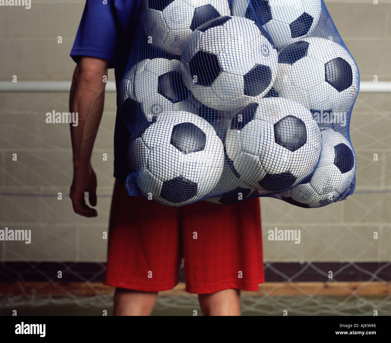 La tenue de football un sac de ballons Banque D'Images