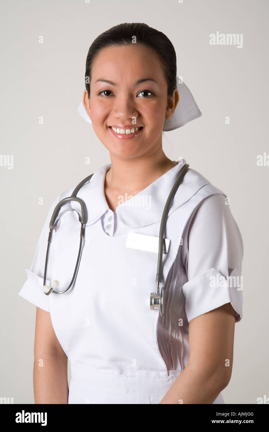 Moitié du corps d'une infirmière en uniforme blanc Photo Stock - Alamy
