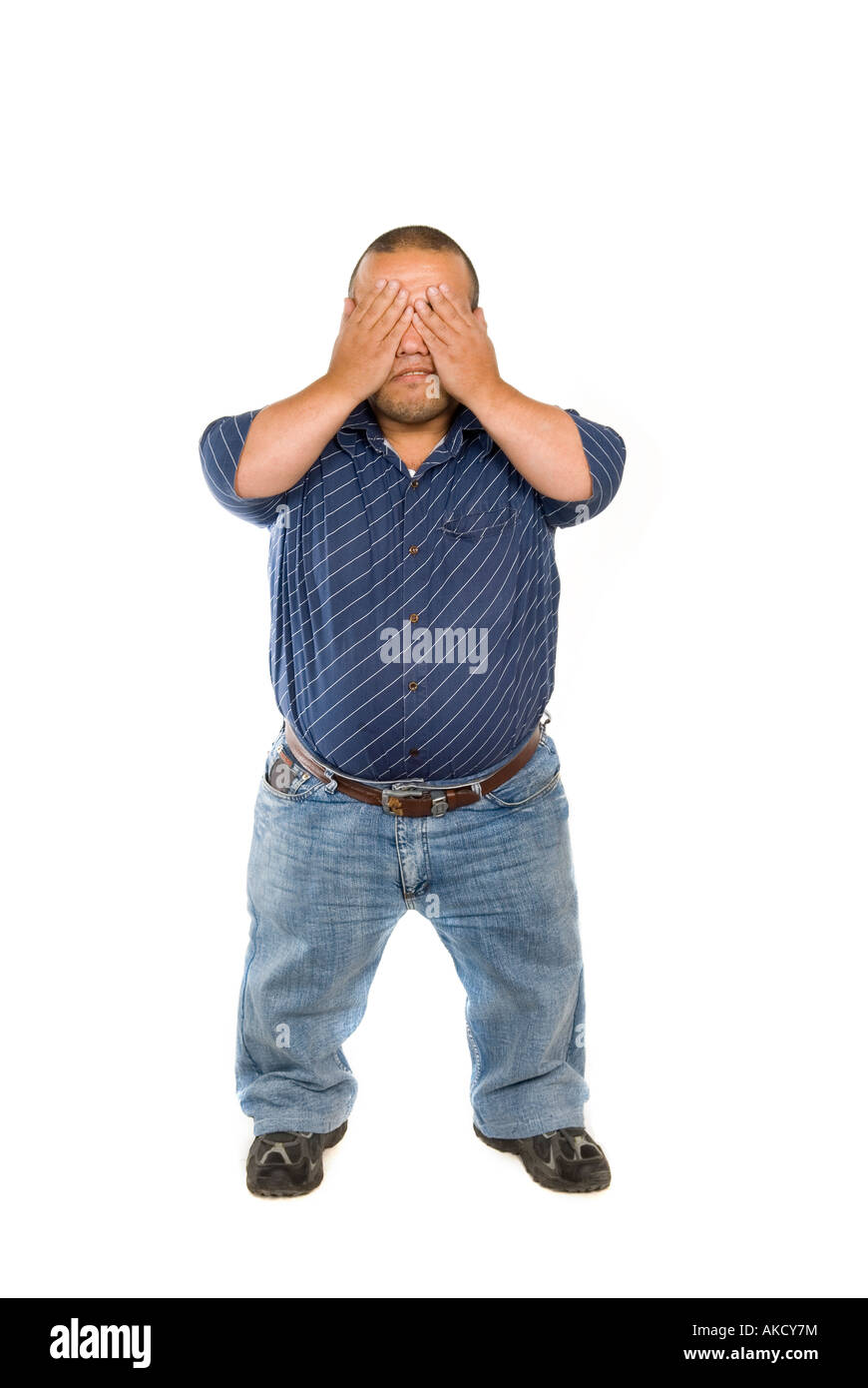 L'homme se cachant son visage Midget Banque D'Images
