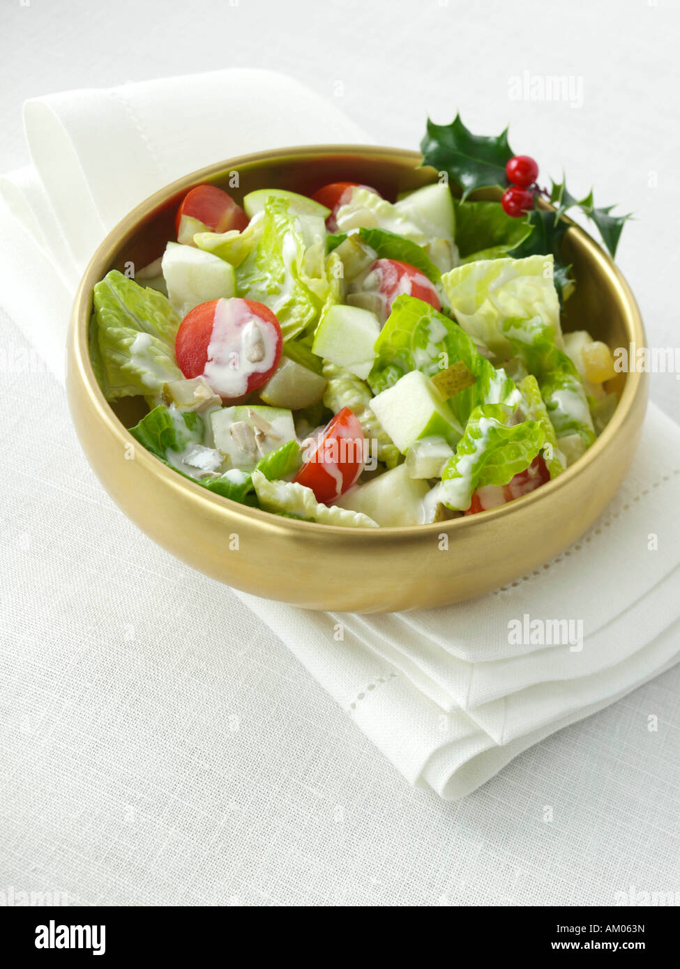 Un bol d'apple et le tournesol salade avec vinaigrette César l'alimentation éditoriale Banque D'Images