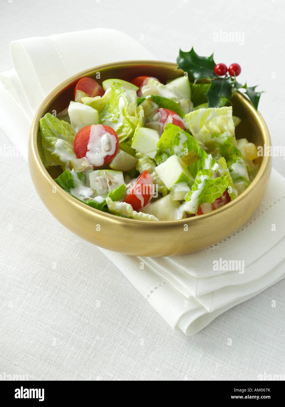 Un bol d'apple et le tournesol salade avec vinaigrette César l'alimentation éditoriale Banque D'Images