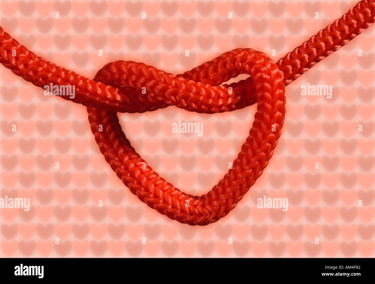 En forme de coeur rouge noeud ou noeud d'amour Photo Stock - Alamy