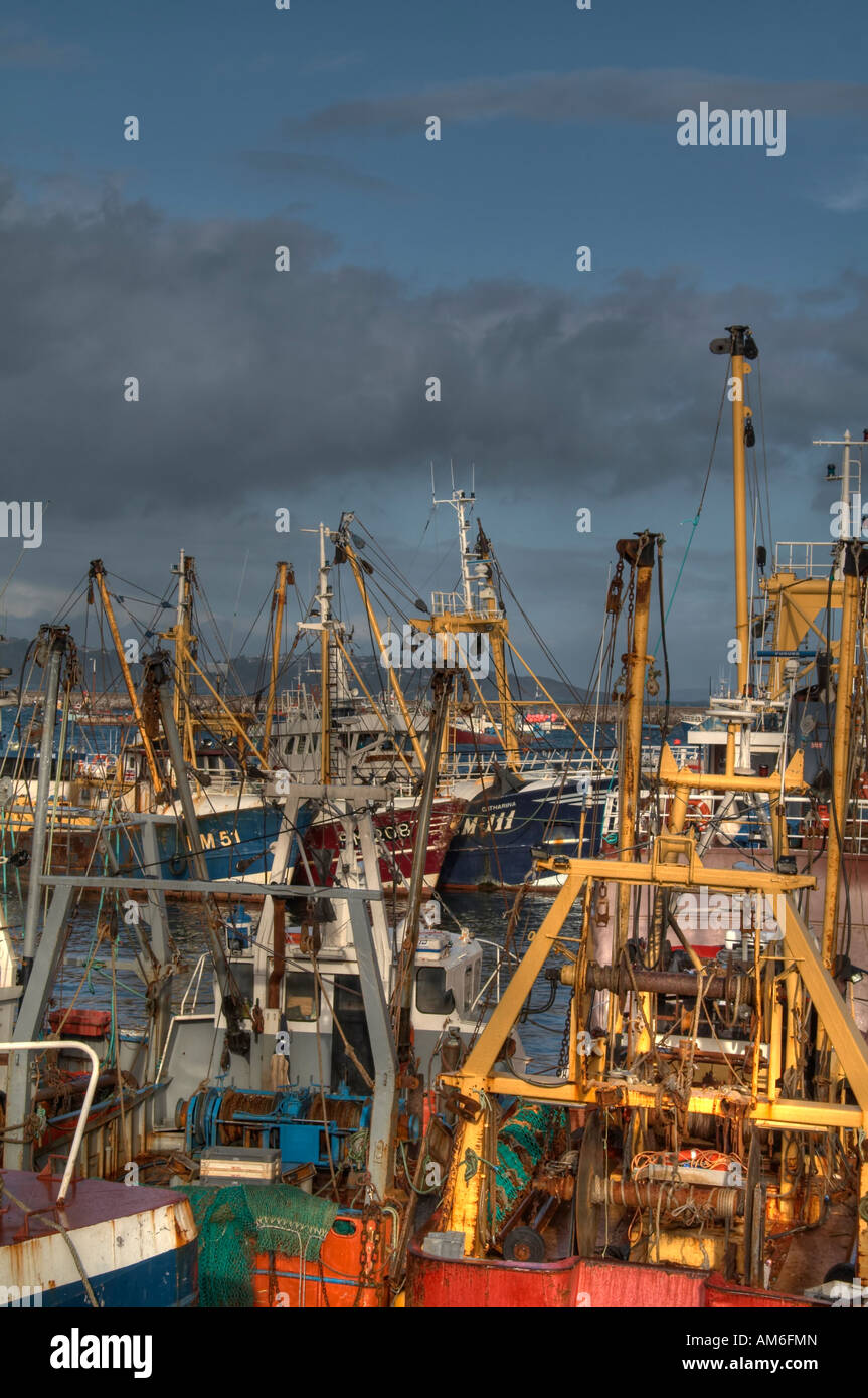Chalutiers à perche en attente de la marée pour changer, leur permettant d'aller à la mer. Banque D'Images