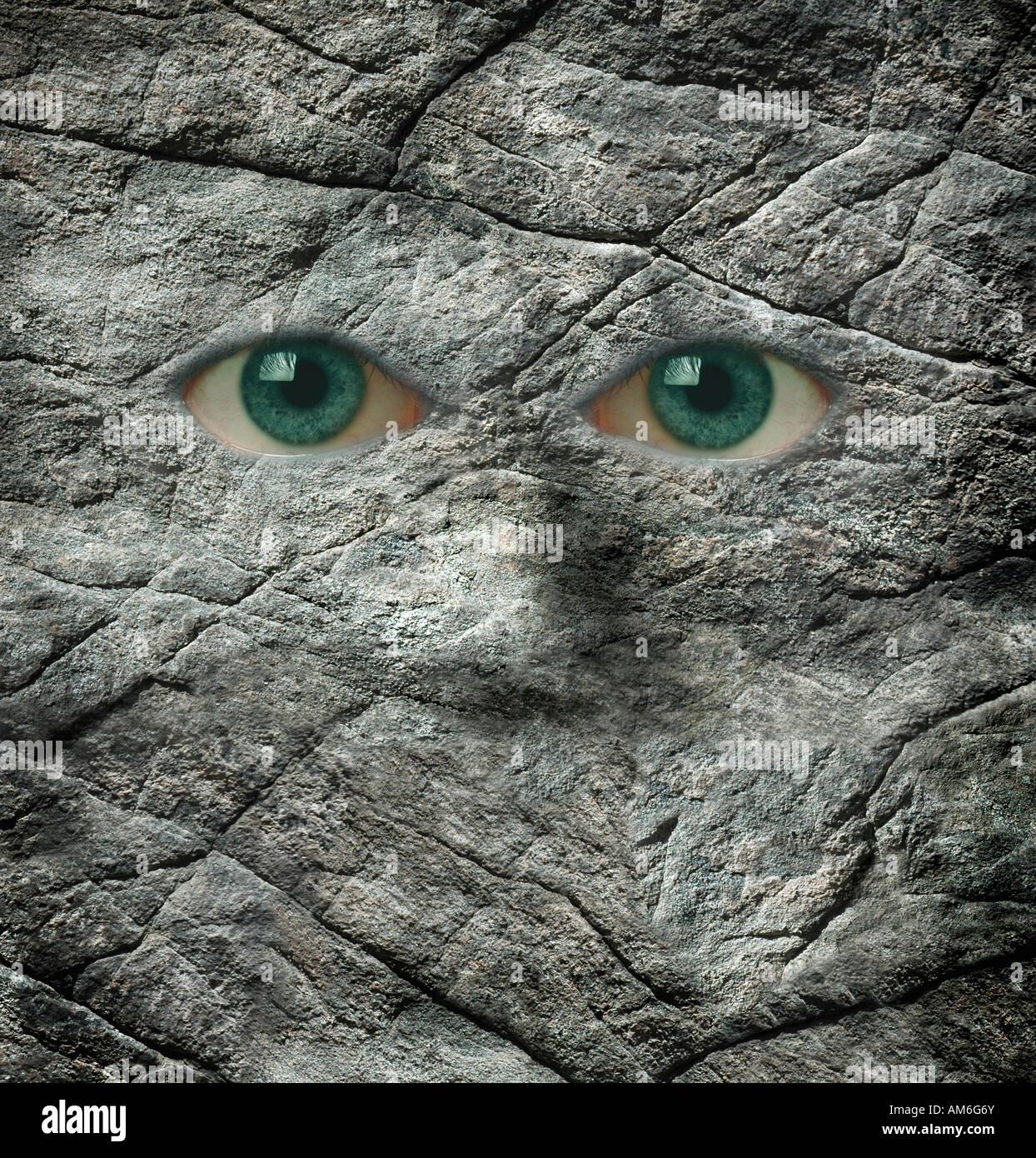 Un visage fait de roches et des yeux humains Banque D'Images