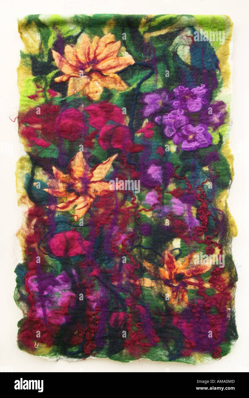Close up of a fleur de fleur en laine laine broderie textile artisanat d'art unique exclusif matériel photo Banque D'Images