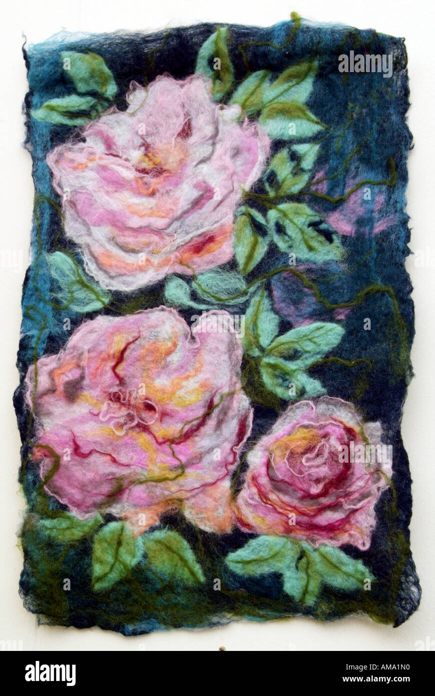 Close up of a fleur de fleur en laine laine broderie textile artisanat d'art uniques exclusifs matériel photo Banque D'Images