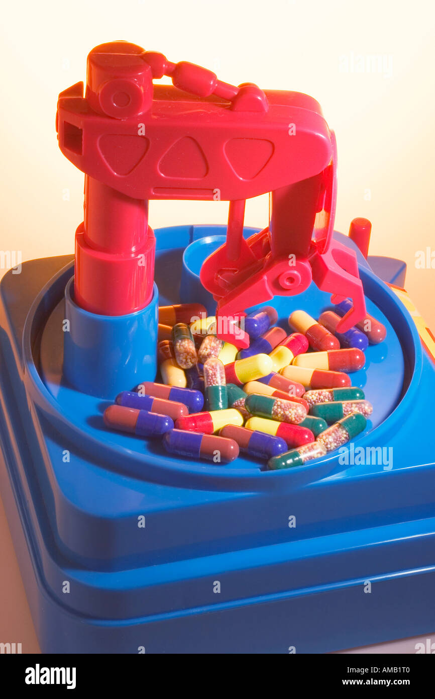Testeur de compétences avec des comprimés de jouets Photo Stock - Alamy