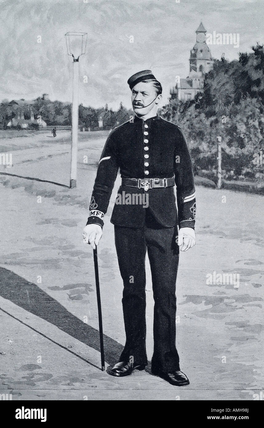 La police militaire britannique Anglais England UK robe uniforme de l'armée de soldat de l'armée 1900 cap stick gant blanc Banque D'Images