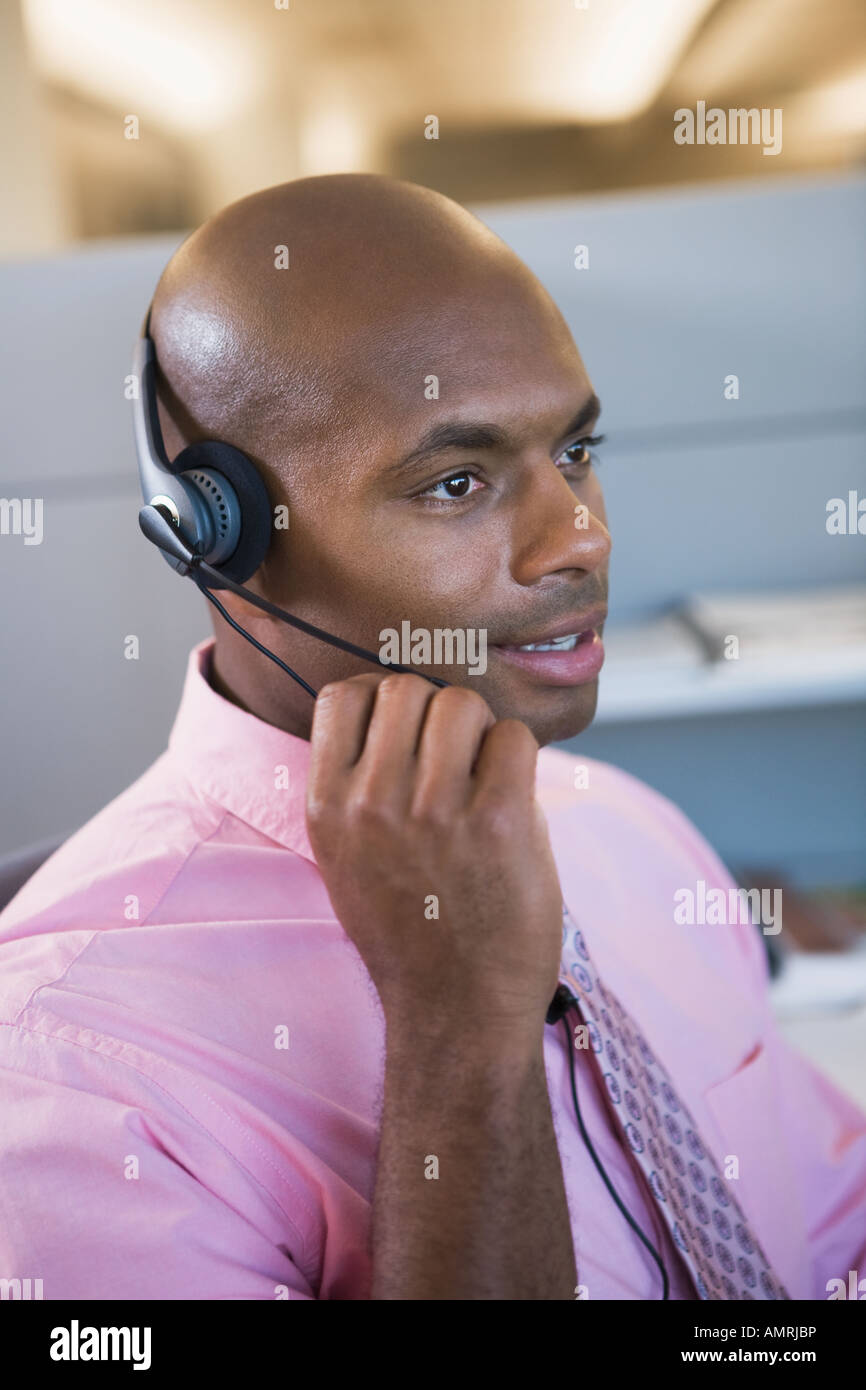 African businessman wearing headset Banque D'Images