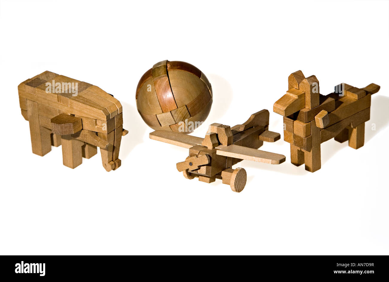 Quatre jouets puzzle en bois classique Banque D'Images