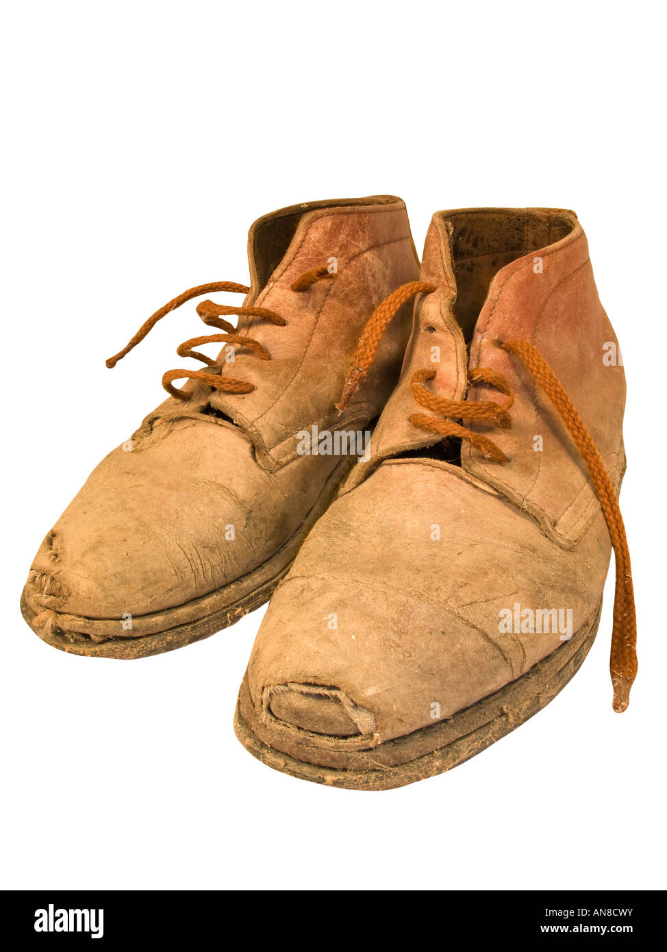 Vieux usé bottes de travail avec des trous Banque D'Images