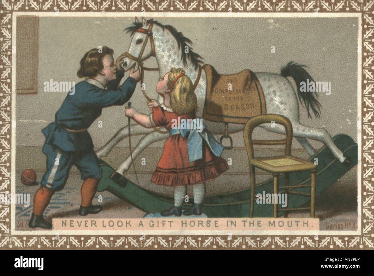 Carte de vœux de Noël intitulé Ne jamais regarder un cheval cadeau dans la bouche" vers 1875 Banque D'Images