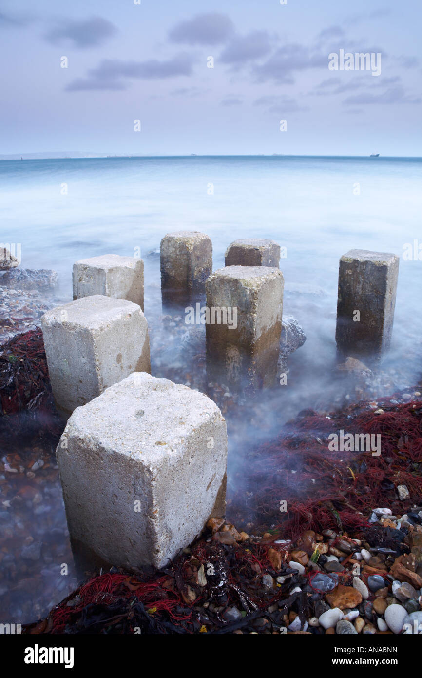 Les blocs de pierre de Portland dans le port de Portland, Dorset, England, UK Banque D'Images