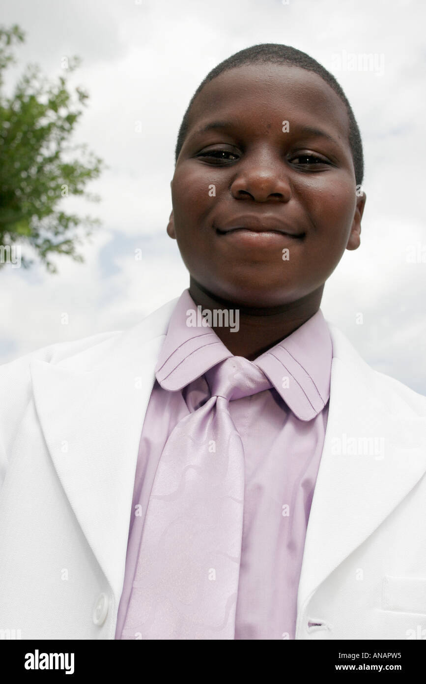 Miami Floride, Bay Waterside Marketplace, famille familles parents parents enfants enfants, jour, Black Blacks Africains ethnie minoritaire, garçons lad l Banque D'Images