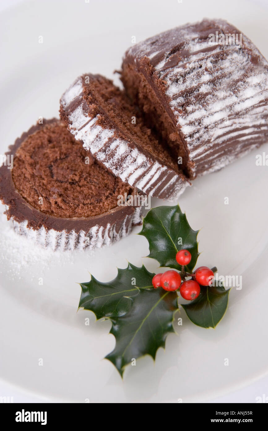 Journal de chocolat de fête d'une branche de houx Banque D'Images