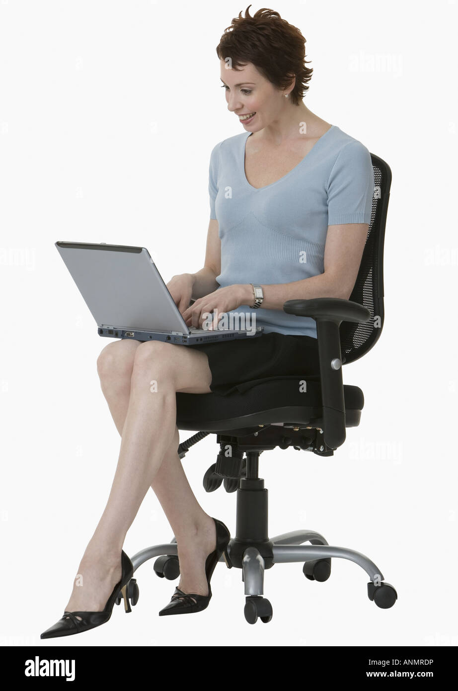 Businesswoman typing on laptop Banque D'Images