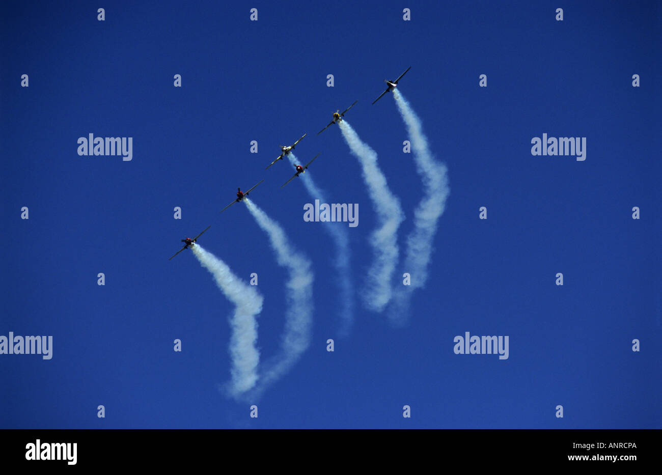 L'équipe display Aerostars en utilisant le Yak 50 avions russes sur Rougham près de Bury St Edmunds, Suffolk, UK. Banque D'Images