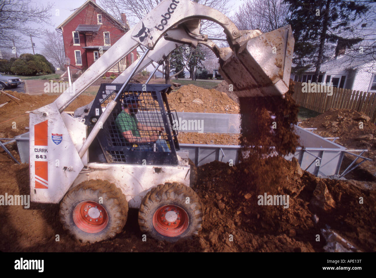 Chargeur bobcat ascenseur piscine prePennsylvaniares Banque D'Images