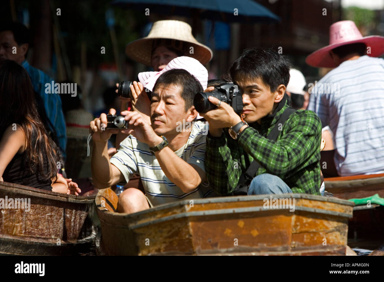 Marché flottant de Damnoen Saduak attraction touristique près de Bangkok en Thaïlande Banque D'Images