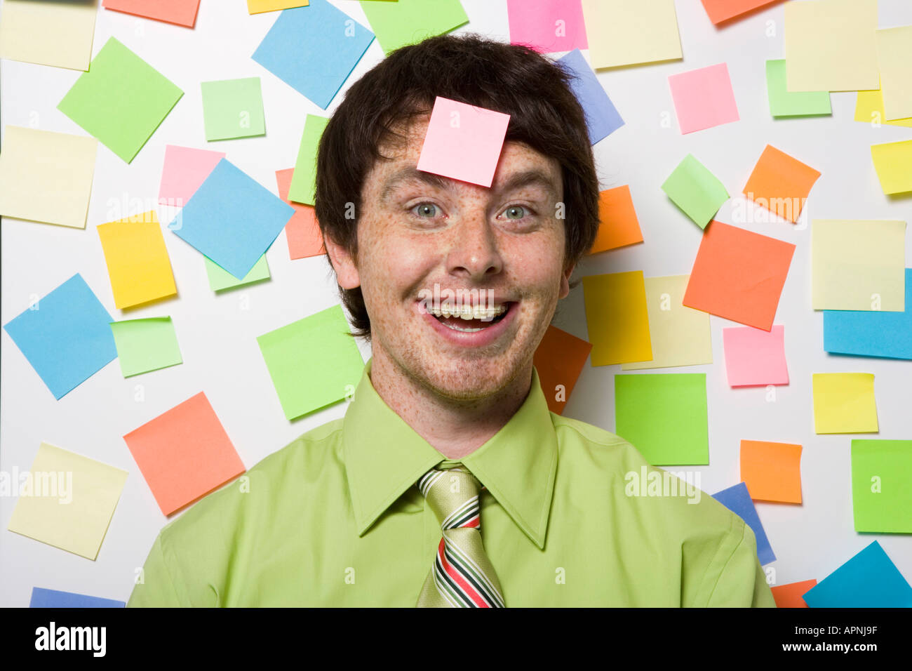 Portrait of office worker with sticky notes Banque D'Images