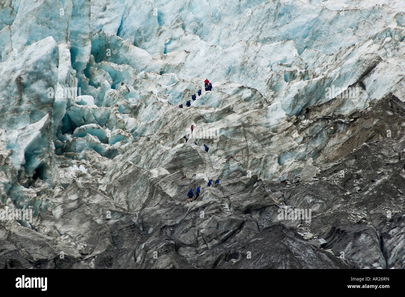 Franz Josef Glacier avec groupe de touristes guidés, Nouvelle-Zélande Banque D'Images
