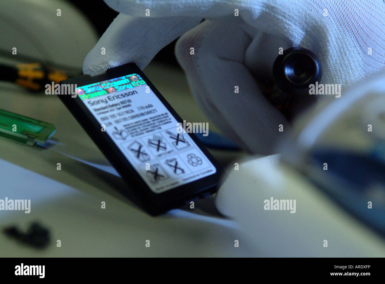 Les tests et les réparations de téléphone mobile Banque D'Images