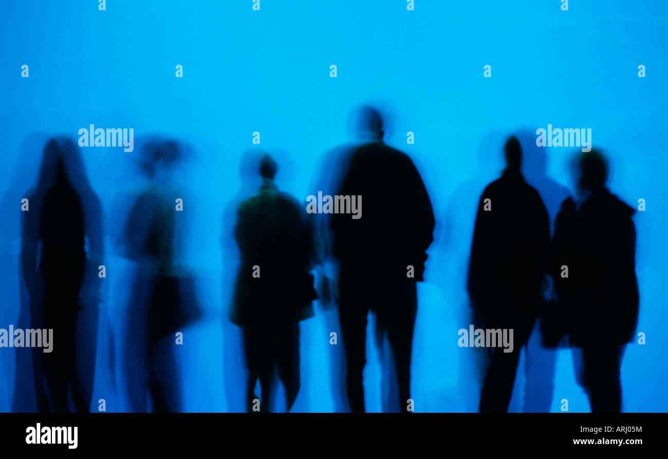 Silhouettes de personnes avec des images fantômes Banque D'Images