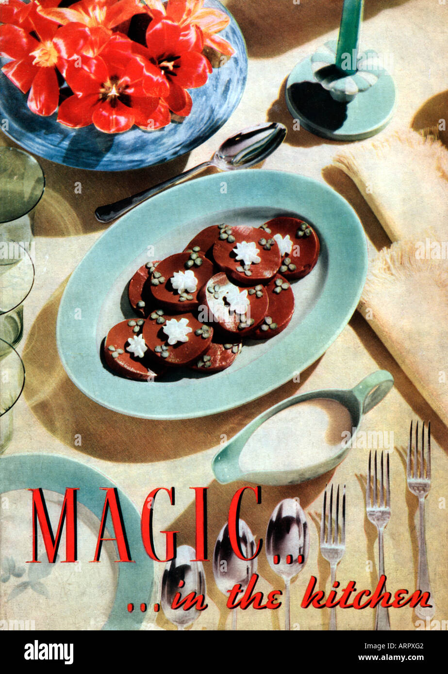 La magie dans la cuisine la couverture d'un livre de cuisinier 1930 publié par Nestlé pour promouvoir leurs produits laitiers Banque D'Images