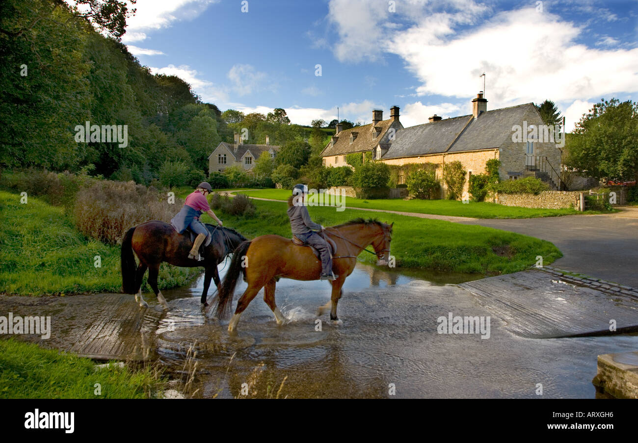 Les cavaliers automne abattage supérieur Cotswolds Banque D'Images