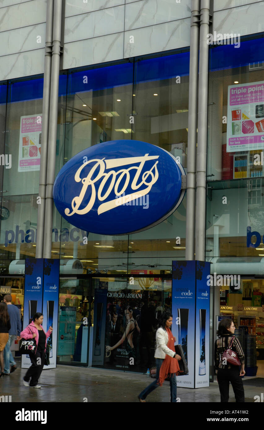 Passage en pharmacie Shoppers Chaussures Oxford Street London UK Banque D'Images