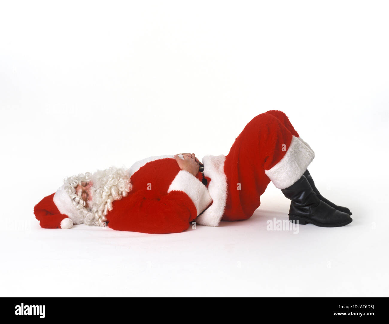 Le Père Noël de couchage sur fond blanc Banque D'Images