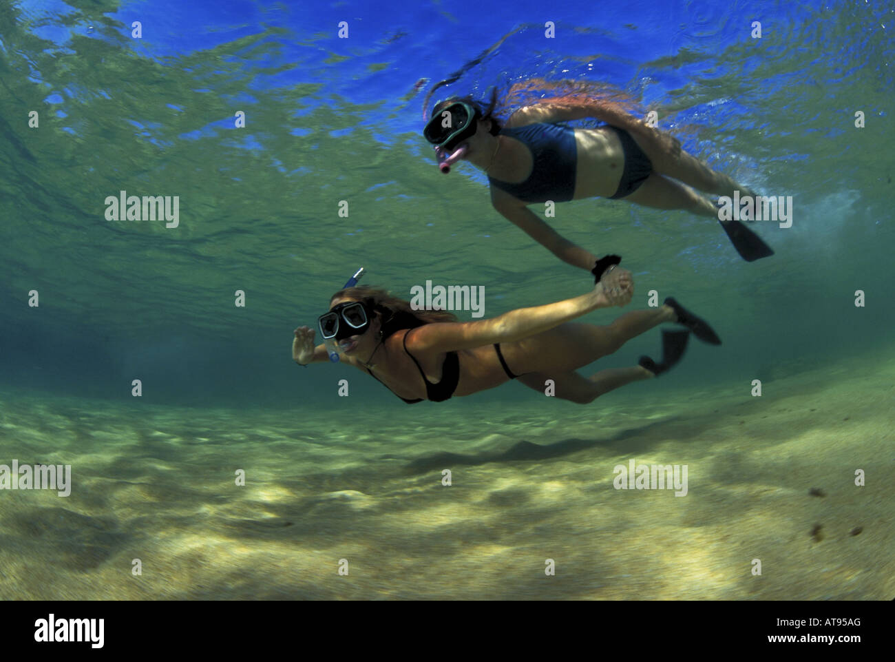 Mère et fille, snorkeling, Haena Kauai Banque D'Images