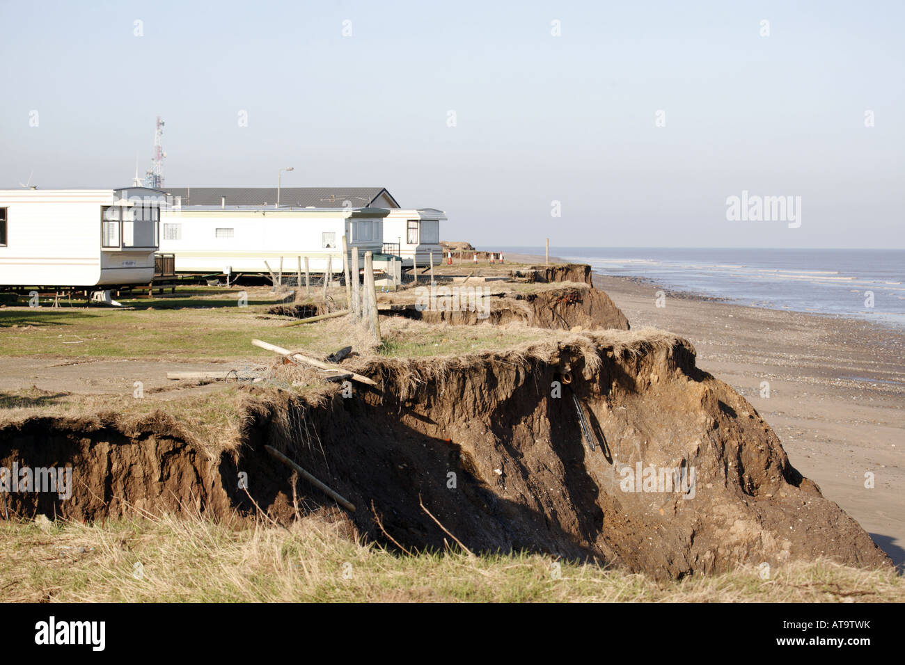 L'érosion côtière et Caravan Park, côte de la mer du Nord, Yorkshire Angleterre Banque D'Images