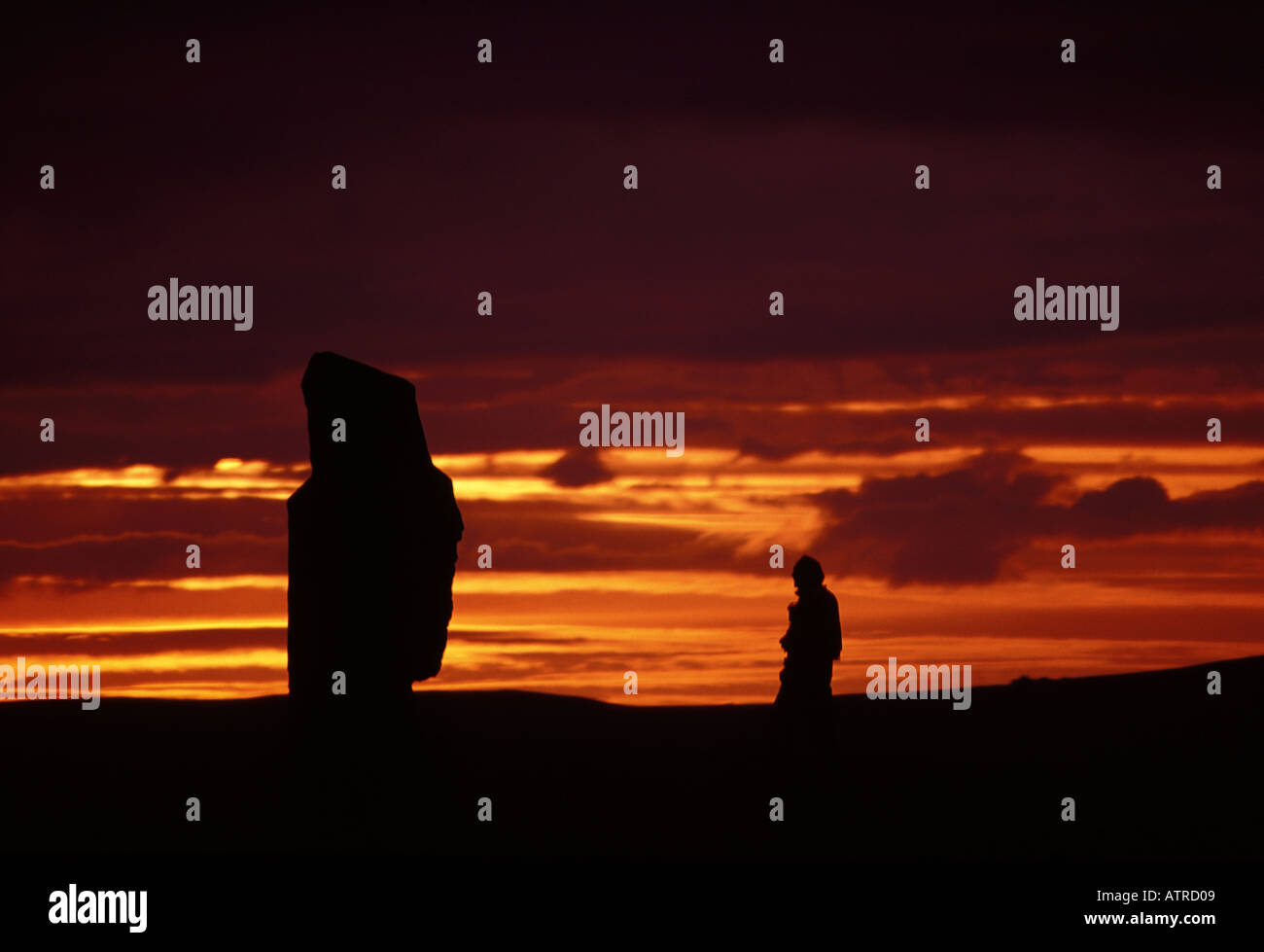 La Grande-Bretagne Royaume-uni Île de coucher du soleil à Orkney Stenness Standing Stones Banque D'Images