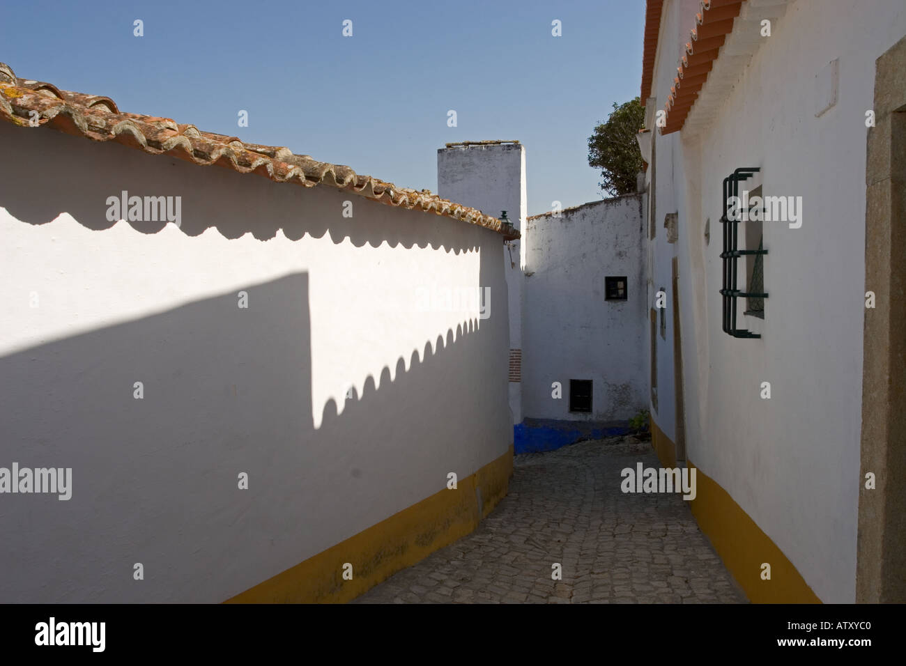 Scène de rue Ville fortifiée d'Obidos Portugal Banque D'Images