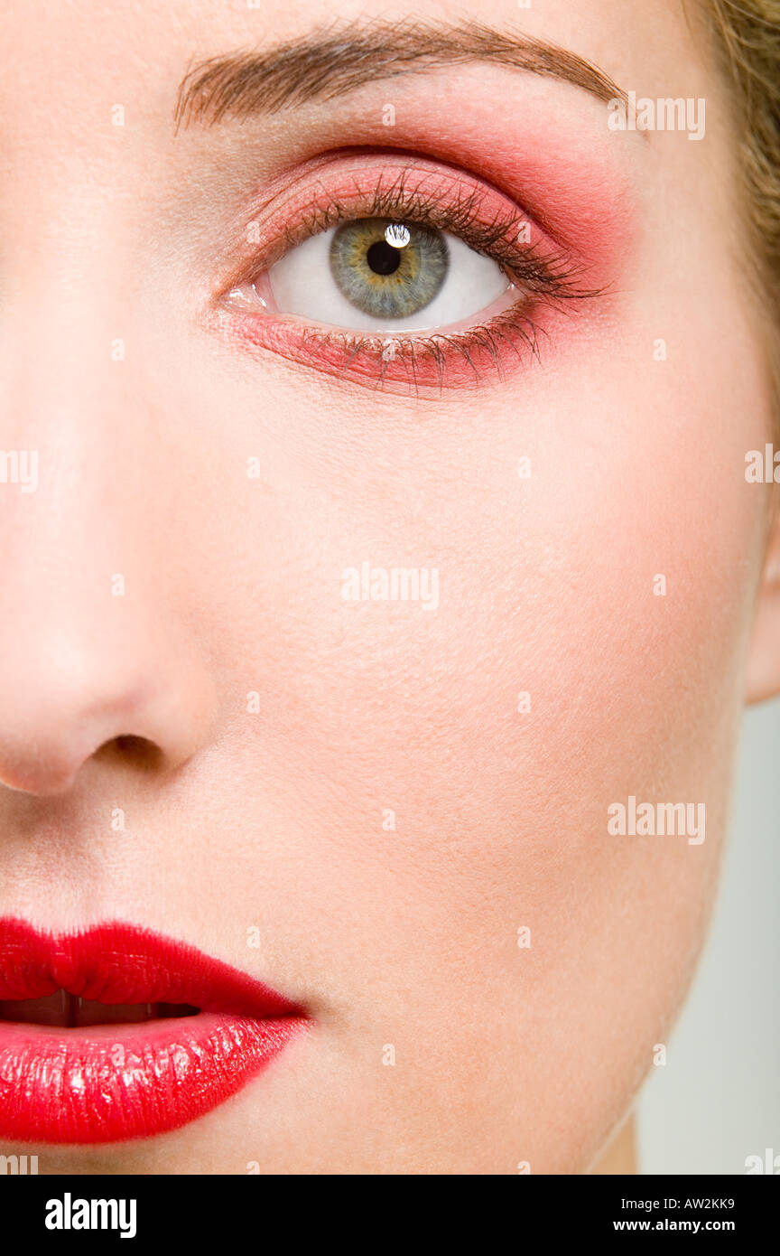 Woman wearing red make-up Banque D'Images