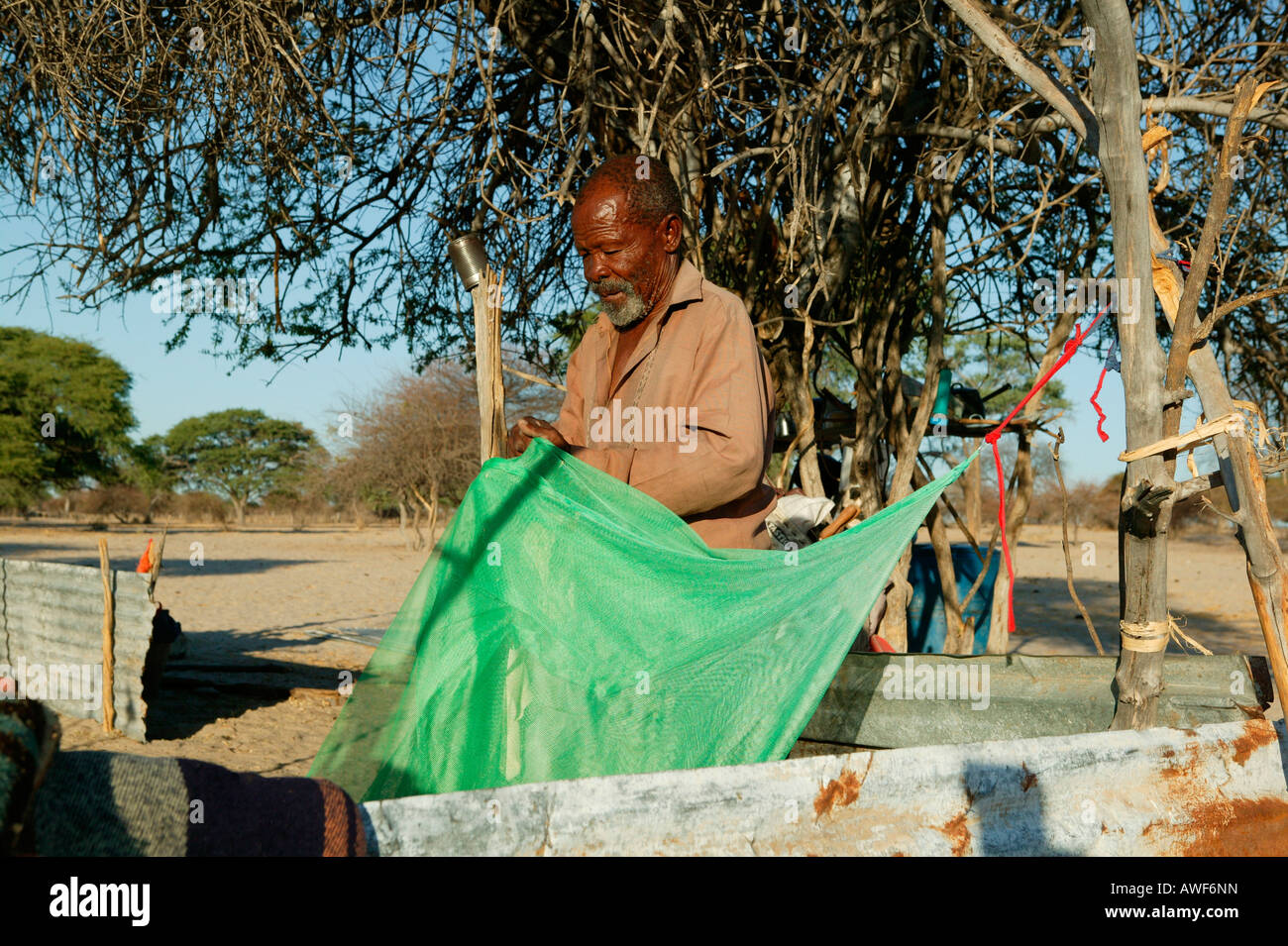 Éleveur de bovins d'établir son Cattlepost Bothatogo la nuit, l'hébergement, Botswana, Africa Banque D'Images