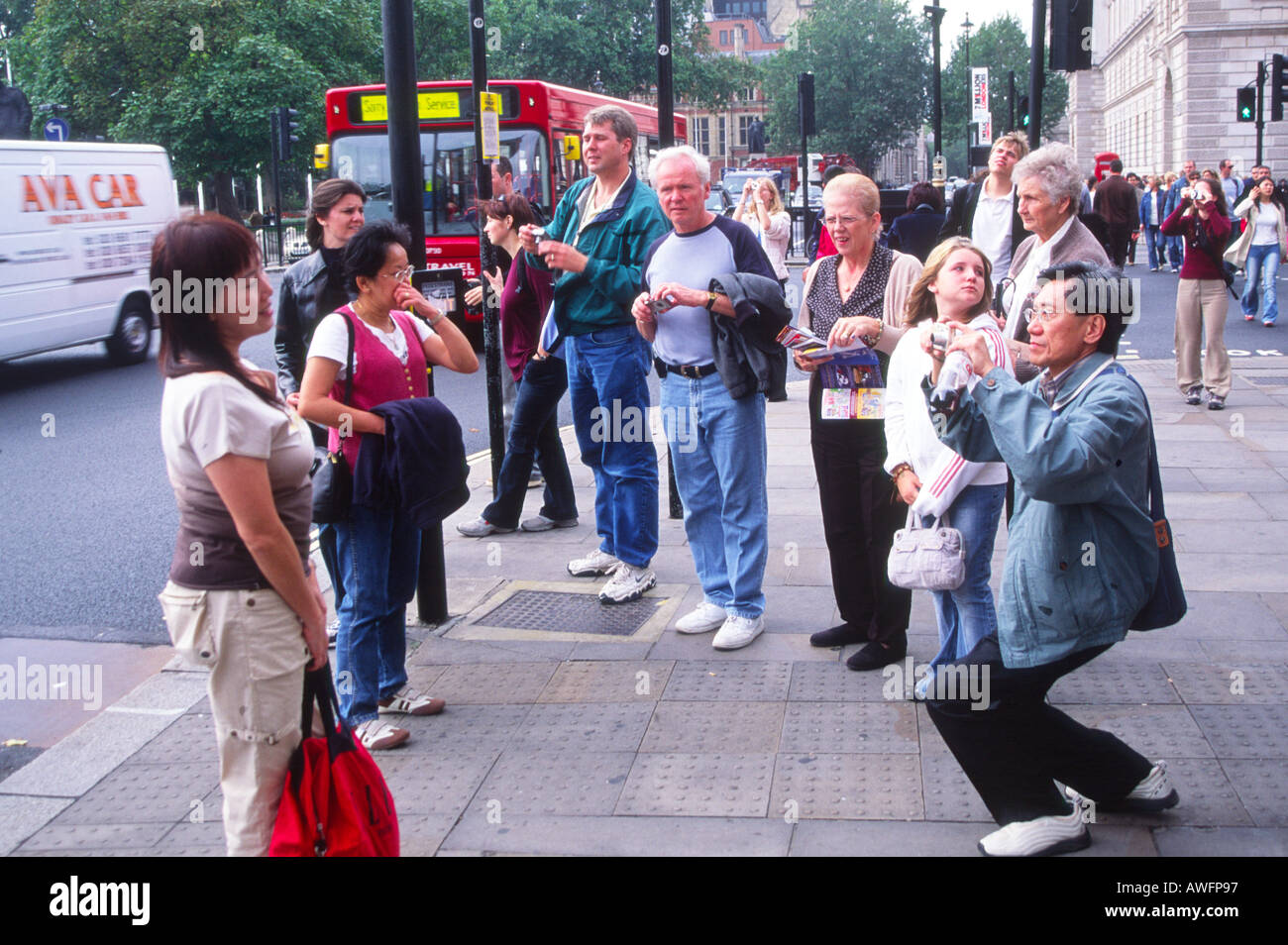 Les touristes de prendre des photos à Londres Banque D'Images