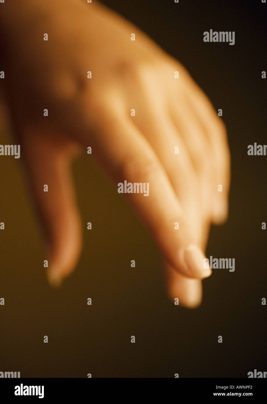 Woman's hand, close-up, blurred Banque D'Images